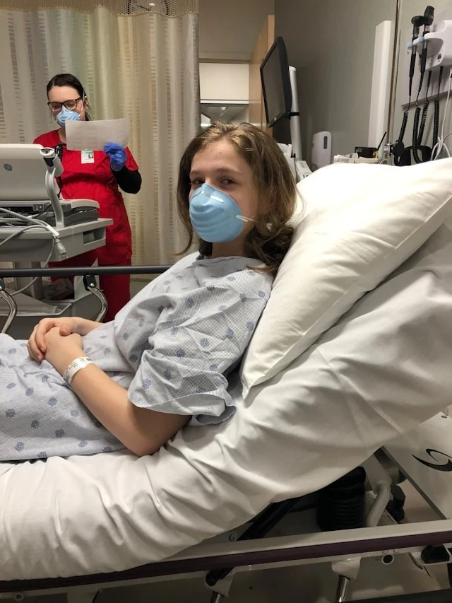 A patient receiving care during a clinical trial